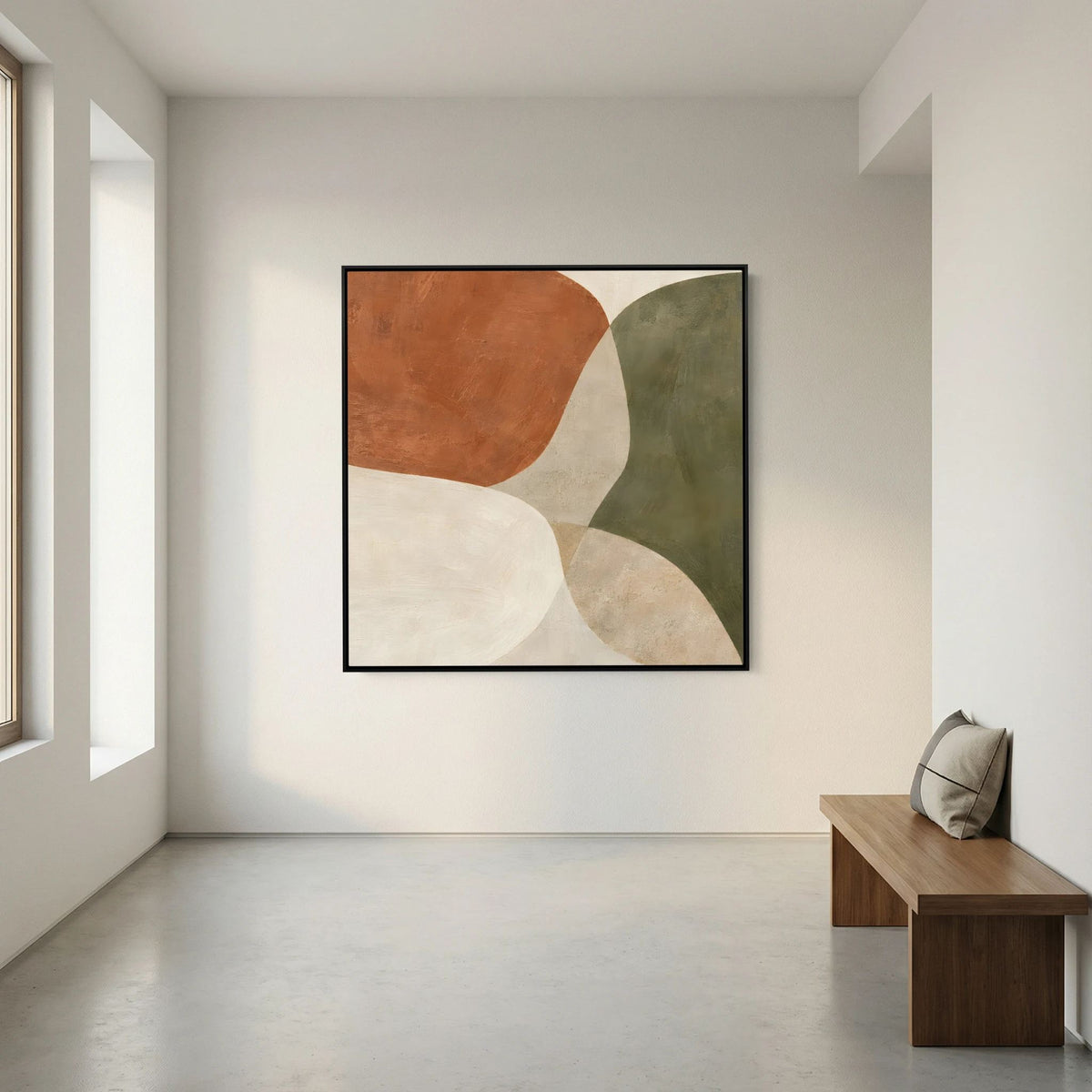 Arte abstrata Earth in Balance numa parede clara junto a um banco num ambiente ilustrativo.